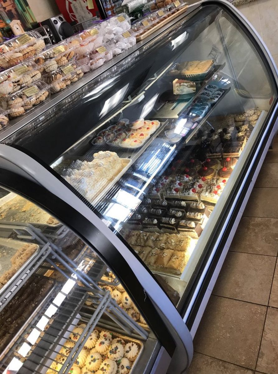 The pastry case at Zukerino, full of European desserts